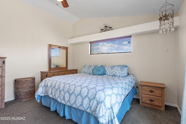 carpeted bedroom featuring ceiling fan and lofted ceiling