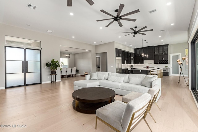 living room featuring light wood-type flooring