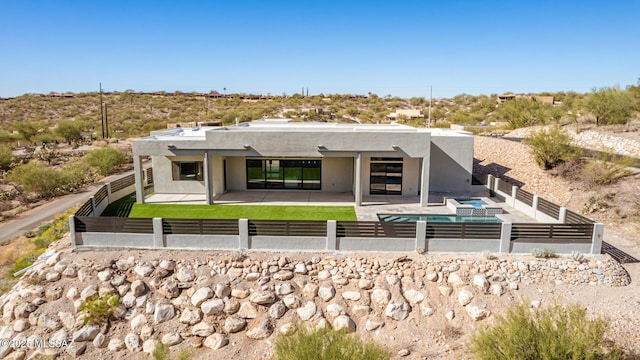 rear view of house featuring a patio area