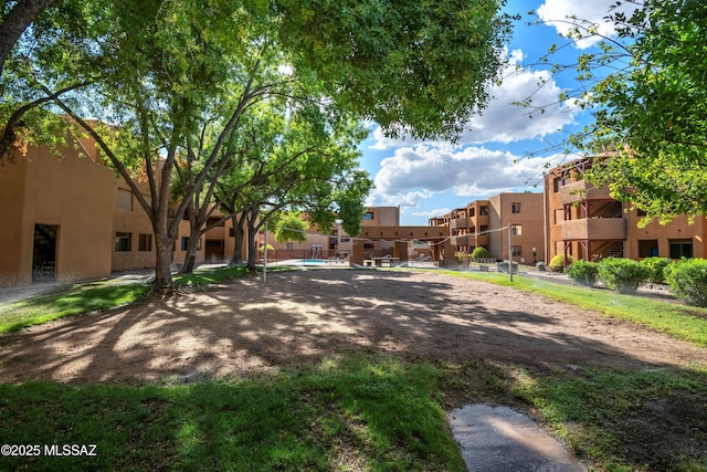 view of home's community with volleyball court