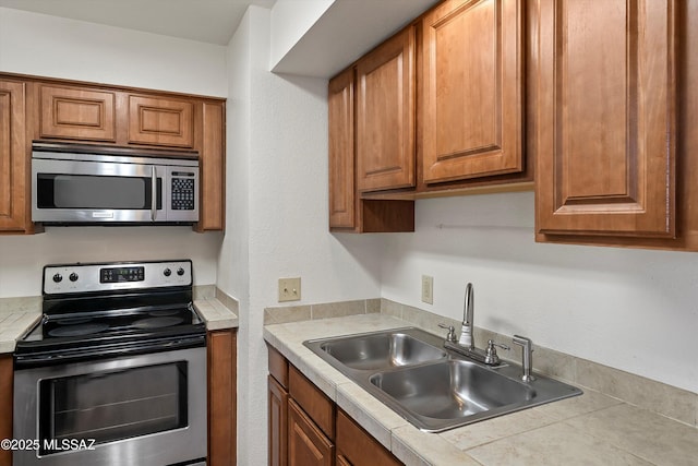 kitchen with stainless steel appliances and sink