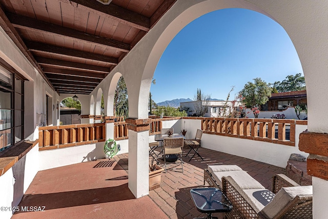 view of patio / terrace with a mountain view