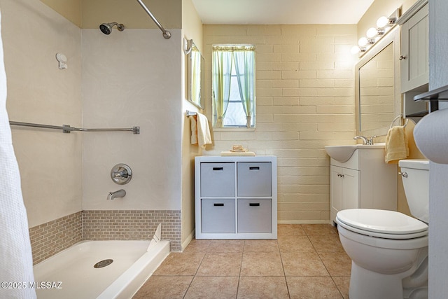 bathroom featuring tile patterned floors, a shower with curtain, toilet, and vanity