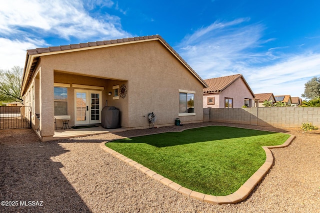 back of house with a patio area