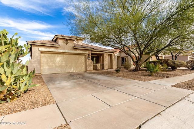 view of front of property featuring a garage