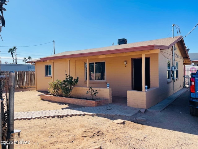 view of front of house featuring central AC unit