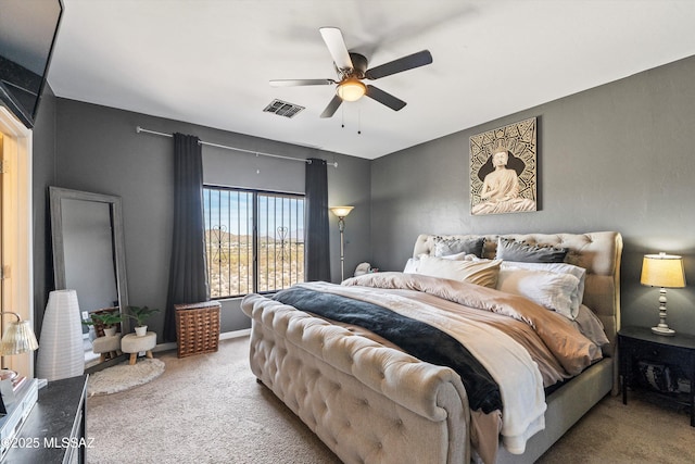 carpeted bedroom featuring ceiling fan