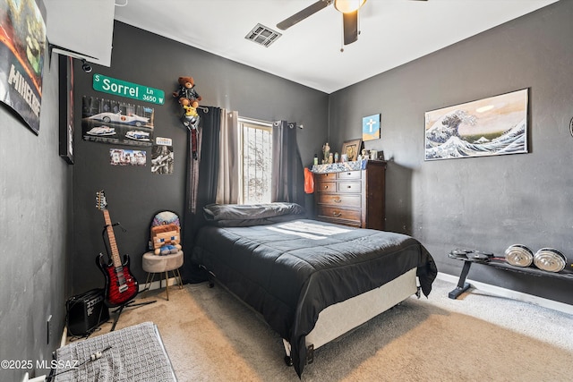 carpeted bedroom featuring ceiling fan