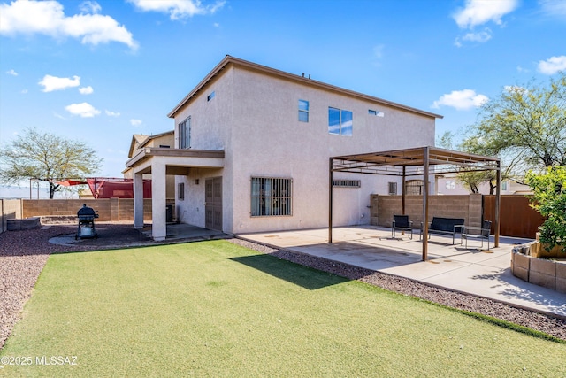 rear view of house featuring cooling unit, a pergola, a patio area, and a lawn