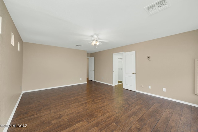 unfurnished room featuring dark hardwood / wood-style floors and ceiling fan