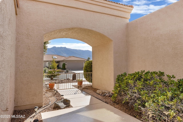 view of patio / terrace featuring a mountain view