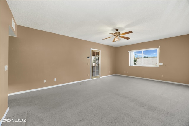 unfurnished room featuring a textured ceiling, ceiling fan, and carpet flooring