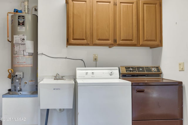 laundry room with cabinets, sink, and gas water heater