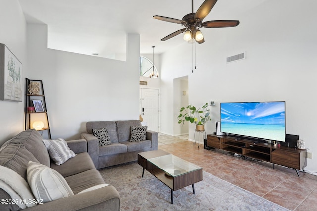 2780 W Camino Llano, Tucson, AZ 85742 - living room featuring light tile patterned floors, visible vents, a high ceiling, and a ceiling fan