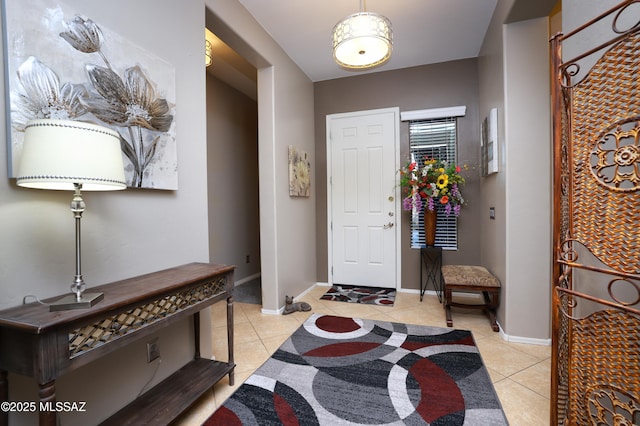 foyer with light tile patterned flooring