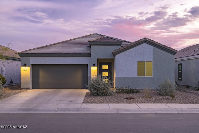 view of front of home featuring a garage