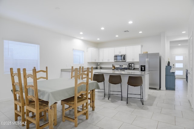 dining room with light tile patterned floors