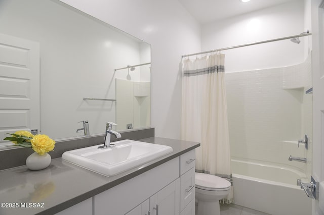 full bathroom with vanity, toilet, and shower / bath combo with shower curtain