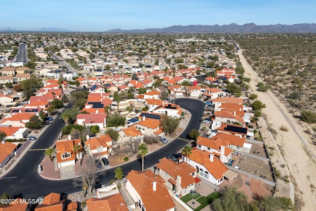 bird's eye view with a mountain view