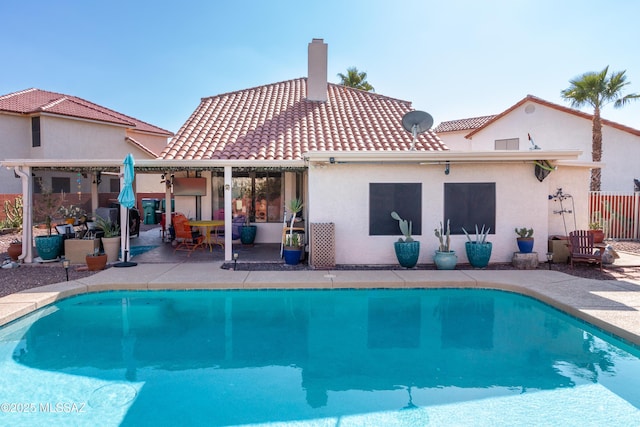 rear view of property with a patio