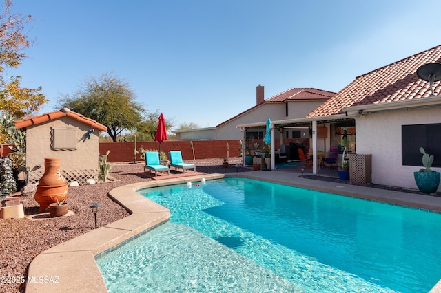 view of pool featuring a patio