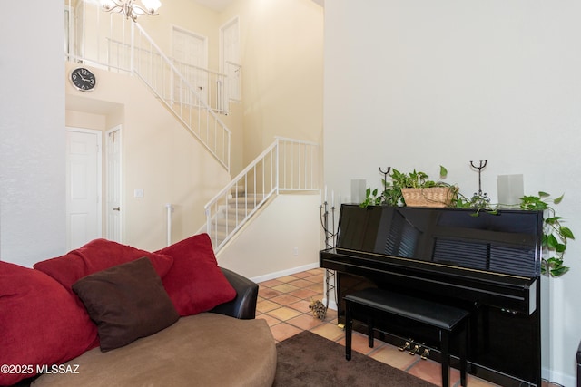 tiled living room with a high ceiling