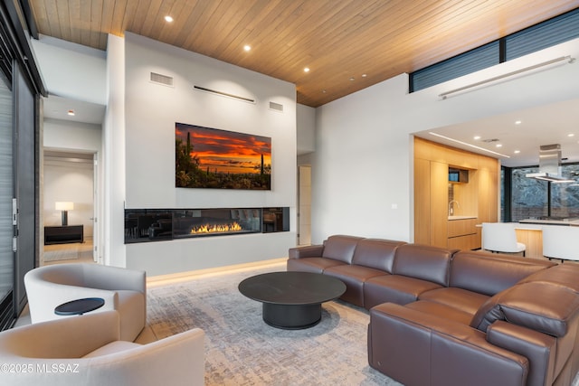 living room featuring wooden ceiling