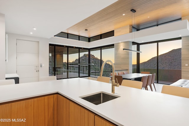 kitchen featuring sink and pendant lighting