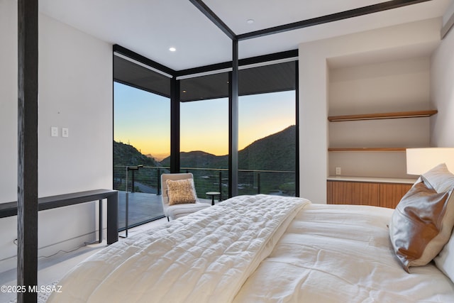 bedroom with a mountain view