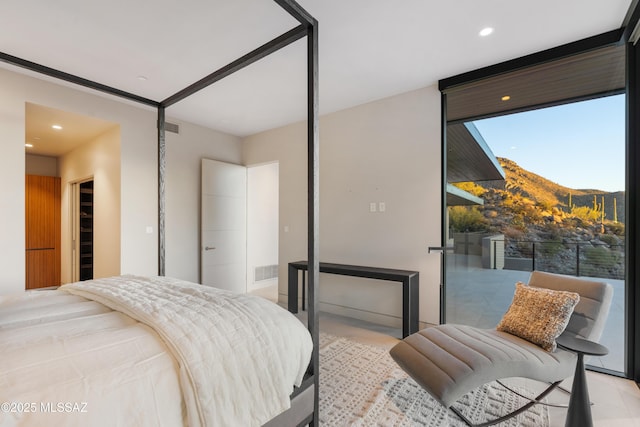 bedroom with a mountain view