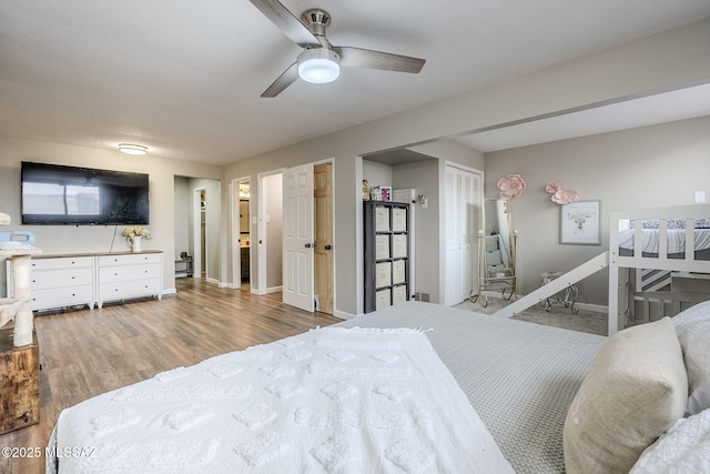 bedroom with wood-type flooring and ceiling fan