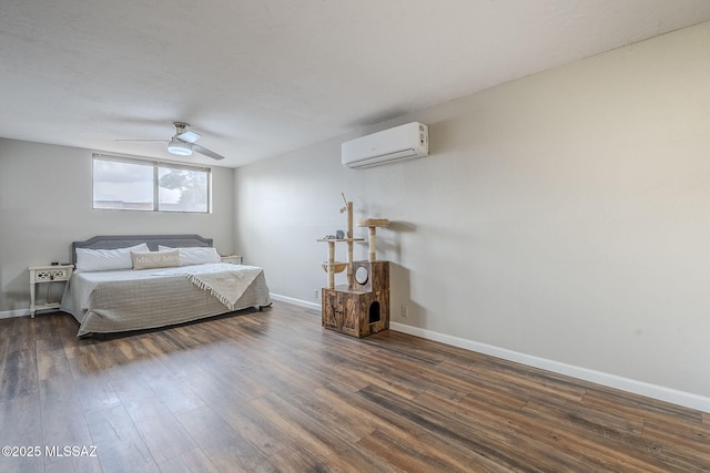 bedroom with an AC wall unit, dark hardwood / wood-style floors, and ceiling fan