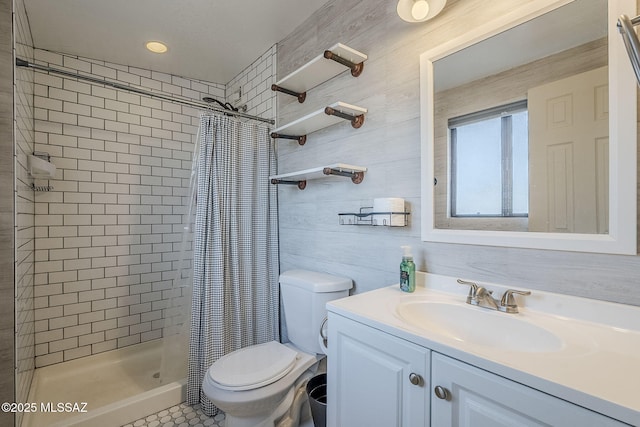 bathroom featuring vanity, toilet, and a shower with shower curtain