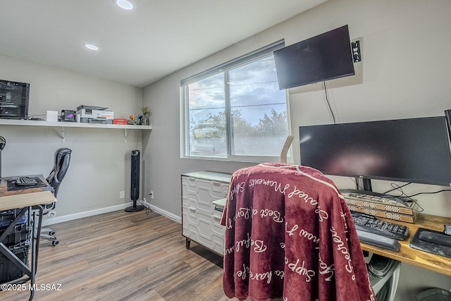 home office featuring hardwood / wood-style flooring