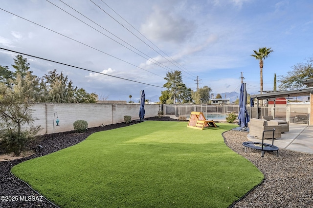 view of yard with a playground