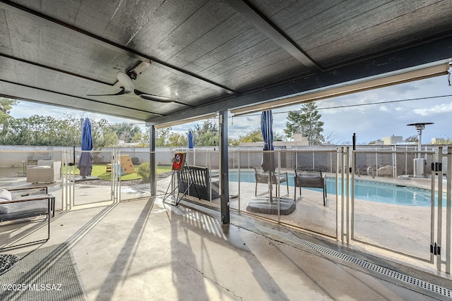 sunroom / solarium with ceiling fan