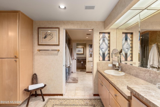 bathroom featuring vanity and tile patterned floors