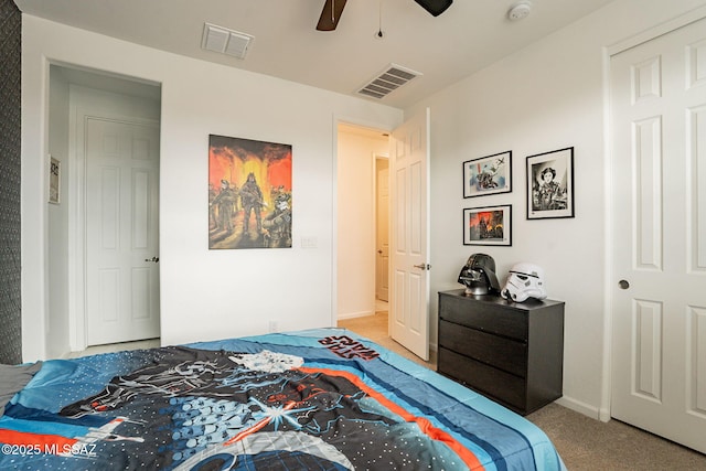 carpeted bedroom featuring ceiling fan