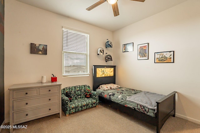 bedroom featuring light carpet and ceiling fan