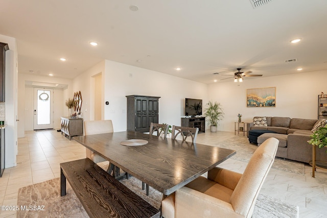 dining room featuring ceiling fan