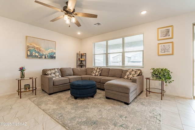 living room with ceiling fan