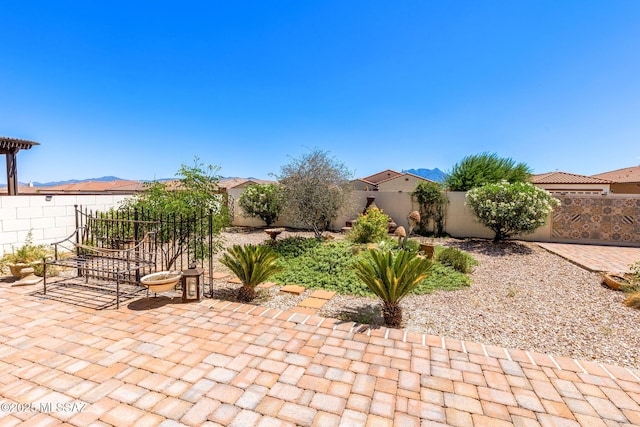 view of patio featuring a mountain view