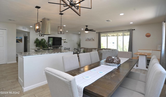 dining space featuring ceiling fan