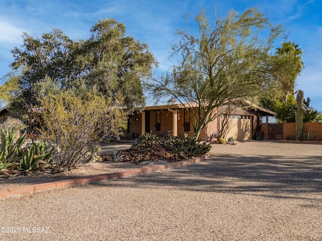 view of front of property with a garage