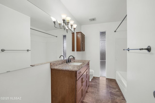 full bathroom featuring shower / tub combination, vanity, toilet, and a notable chandelier