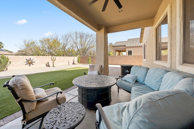 view of patio featuring outdoor lounge area and ceiling fan