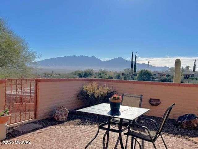 view of patio featuring a mountain view