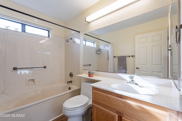 full bathroom featuring vanity, toilet, and shower / tub combo with curtain