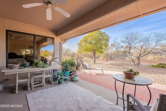 view of patio / terrace featuring ceiling fan