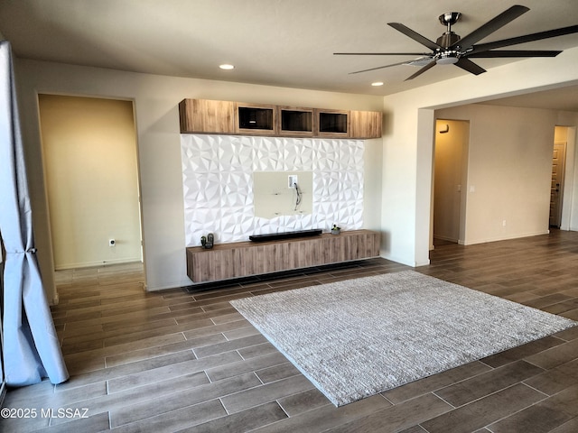 living room featuring ceiling fan